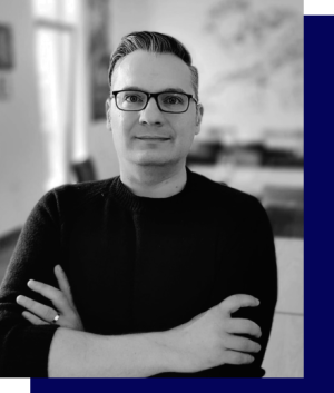 Black and white portrait photo of Daniel Prindii